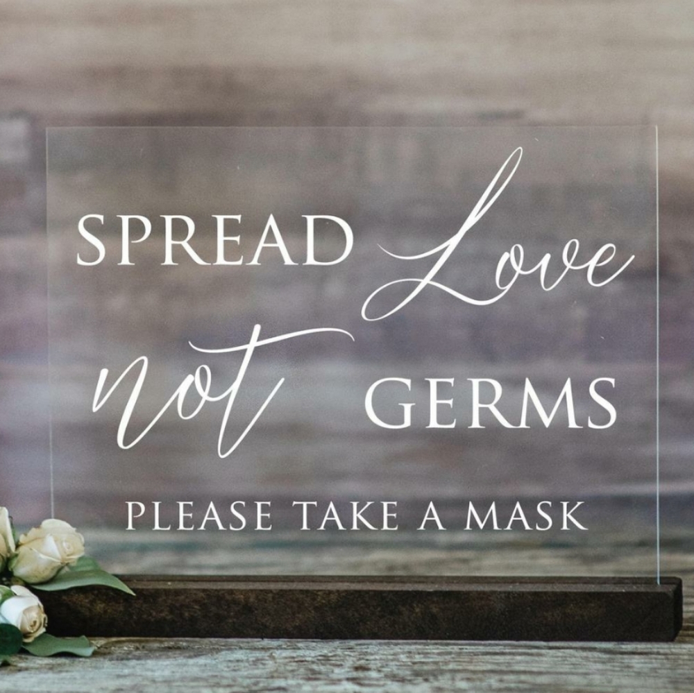 Spread Love Not Germs social distancing sign